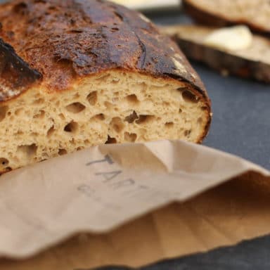A close-up of a cross-section of Tartine bread