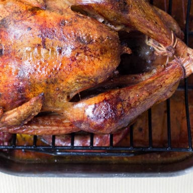 Close up of a whole roasted chicken