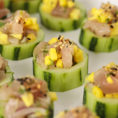 Tuna tartare cucumber cups geometrically arranged