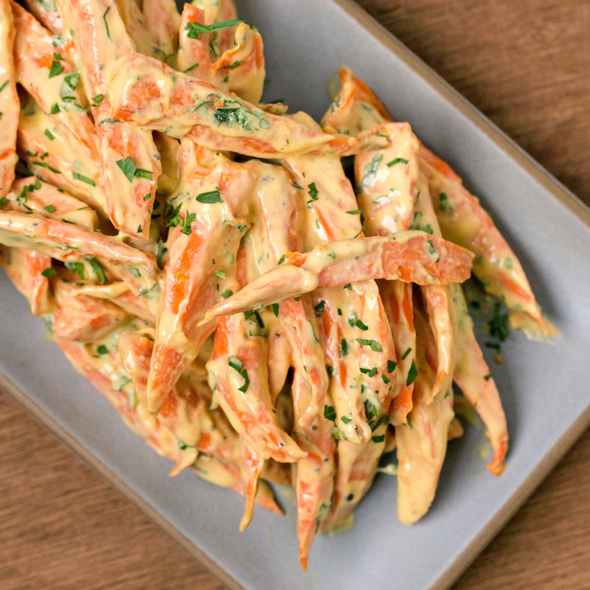 Mama's Carrots recipe served on a grey platter