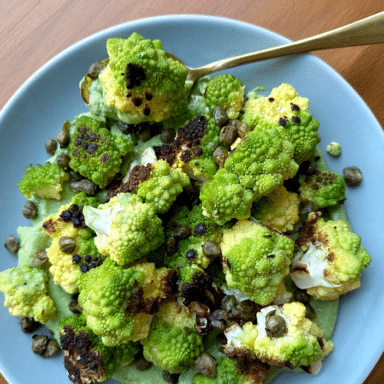 A Big Blue Platter Of Bright Green Romanesco Arranged On A Creamy Green Sauce
