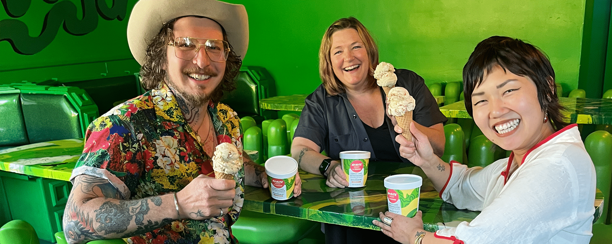 Shuggies And Birite Team Photo Sitting In Dining Room With Ice Cream Cones